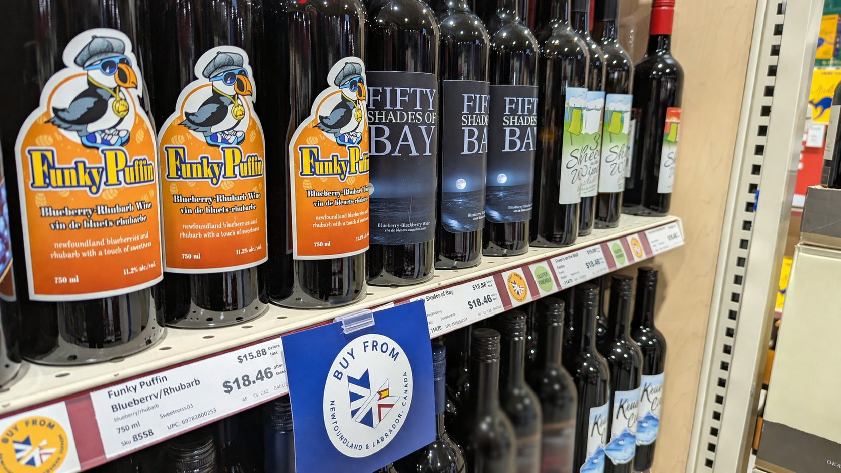 Great Auk wine bottles displayed on liquor-store shelves